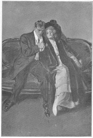 Her head sank upon his shoulder, her hands clasped
his.