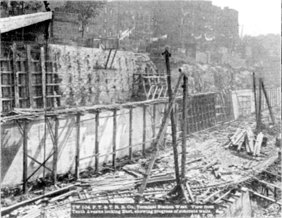 Plate L, Fig. 4.&mdash; TW 104, P.N.Y. & L.I.R.R. Terminal Station West. View from Tenth Avenue looking East, showing progress of concrete walls. Aug. 7, 09.
