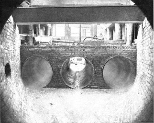 THREE PIPES SUBSTITUTED FOR LARGE BRICK SEWER AT 110TH
STREET AND LENOX AVENUE