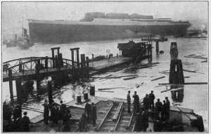 Photograph by Underwood & Underwood, N. Y.
SCENE IN GERMAN SHIP-BUILDING YARD
The great ship in the background has just been launched. Though the war left Germany no man to spare, every effort
has been made to materially increase the country's merchant marine. To-day Germany's mercantile fleet is stronger than ever.